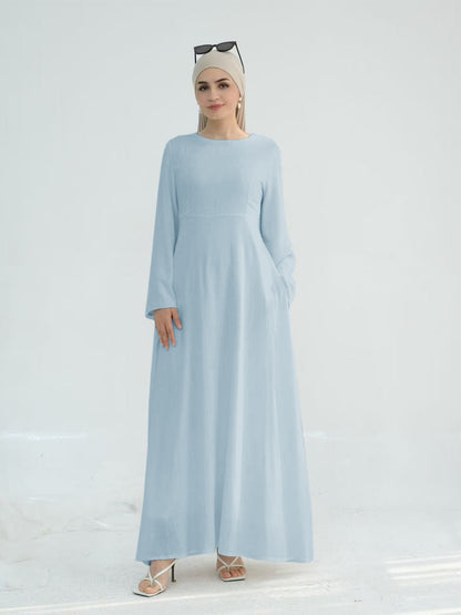 Robe maxi élégante pour dames avec des manches longues et des poches latérales Chic und Stil