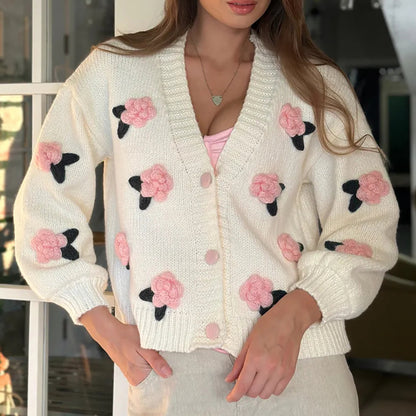 Dames cardigan avec des applications florales et des manches volumineuses Chic und Stil