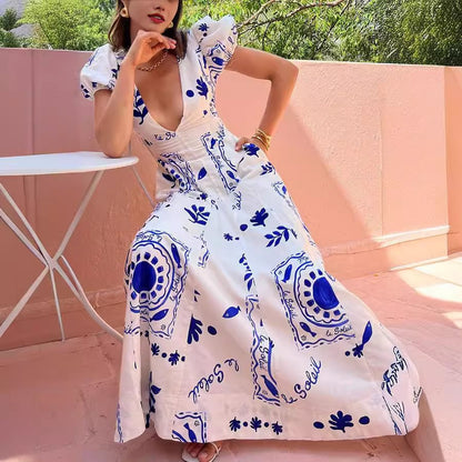 Robe maxi femme avec des manches bouffantes volumineuses et des motifs floraux Chic und Stil