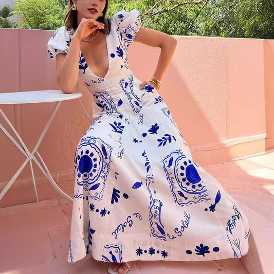 Robe maxi femme avec des manches bouffantes volumineuses et des motifs floraux Chic und Stil