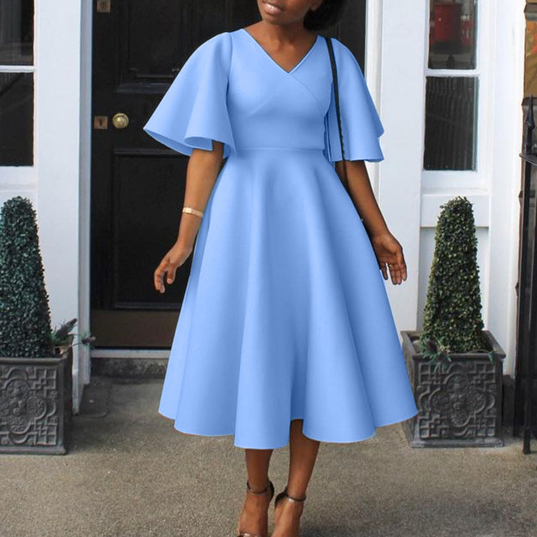 Robe portefeuille pour femmes avec une coupe fluide et des manches volumineuses Chic und Stil