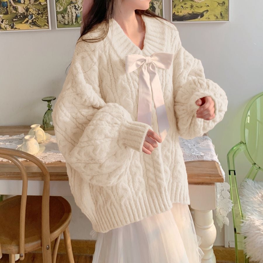 Dames Grand pull en tricot avec détail en noeud et motif en torsades Chic und Stil