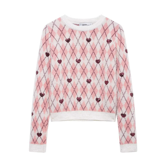 Pull femme avec motif en forme de cœur et éléments scintillants Chic und Stil