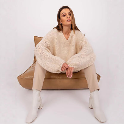 Pull en maille surdimensionné confortable pour dames avec des manches volumineuses et un design texturé Chic und Stil