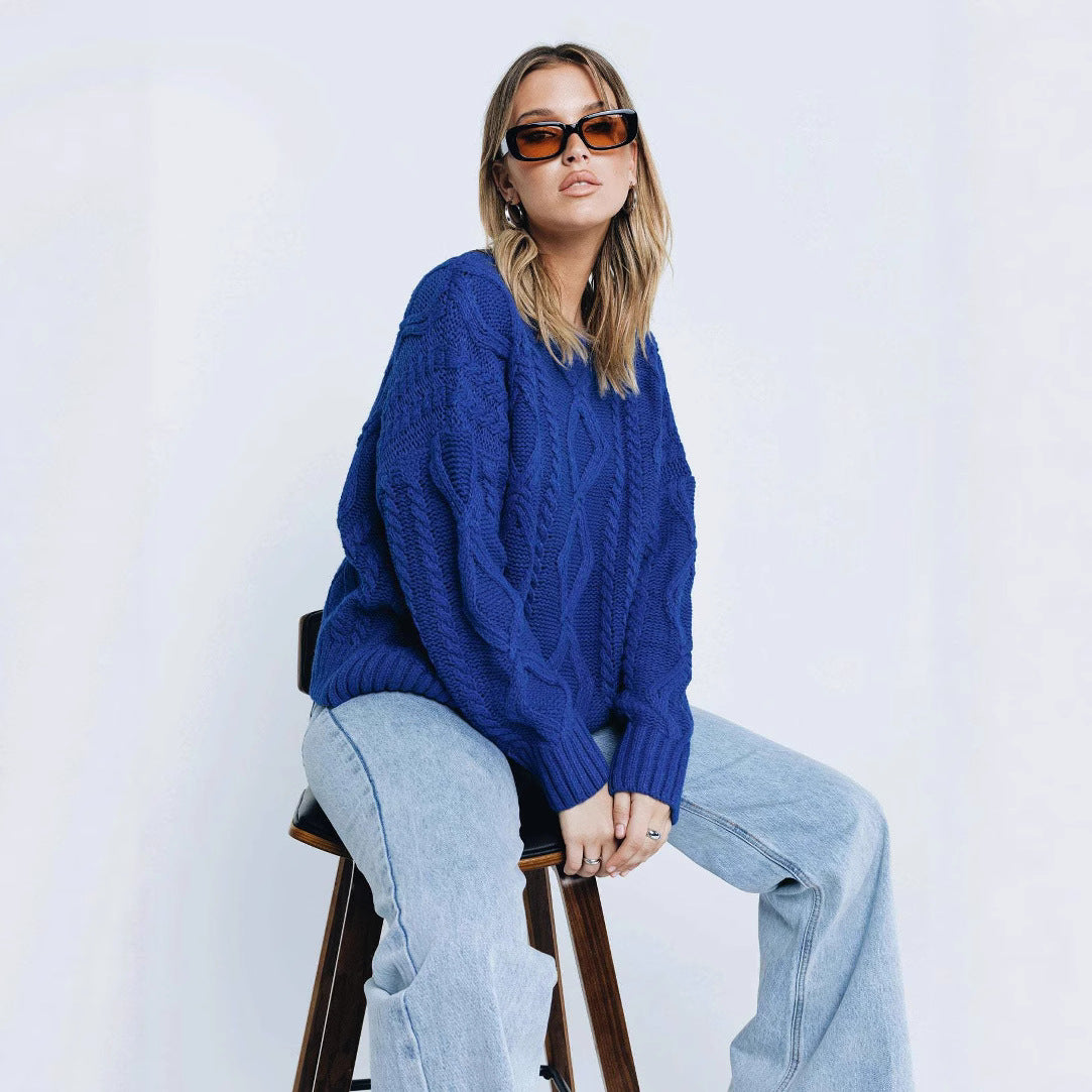 Pull femme en grosse maille avec des manches volumineuses et un motif torsadé classique Chic und Stil