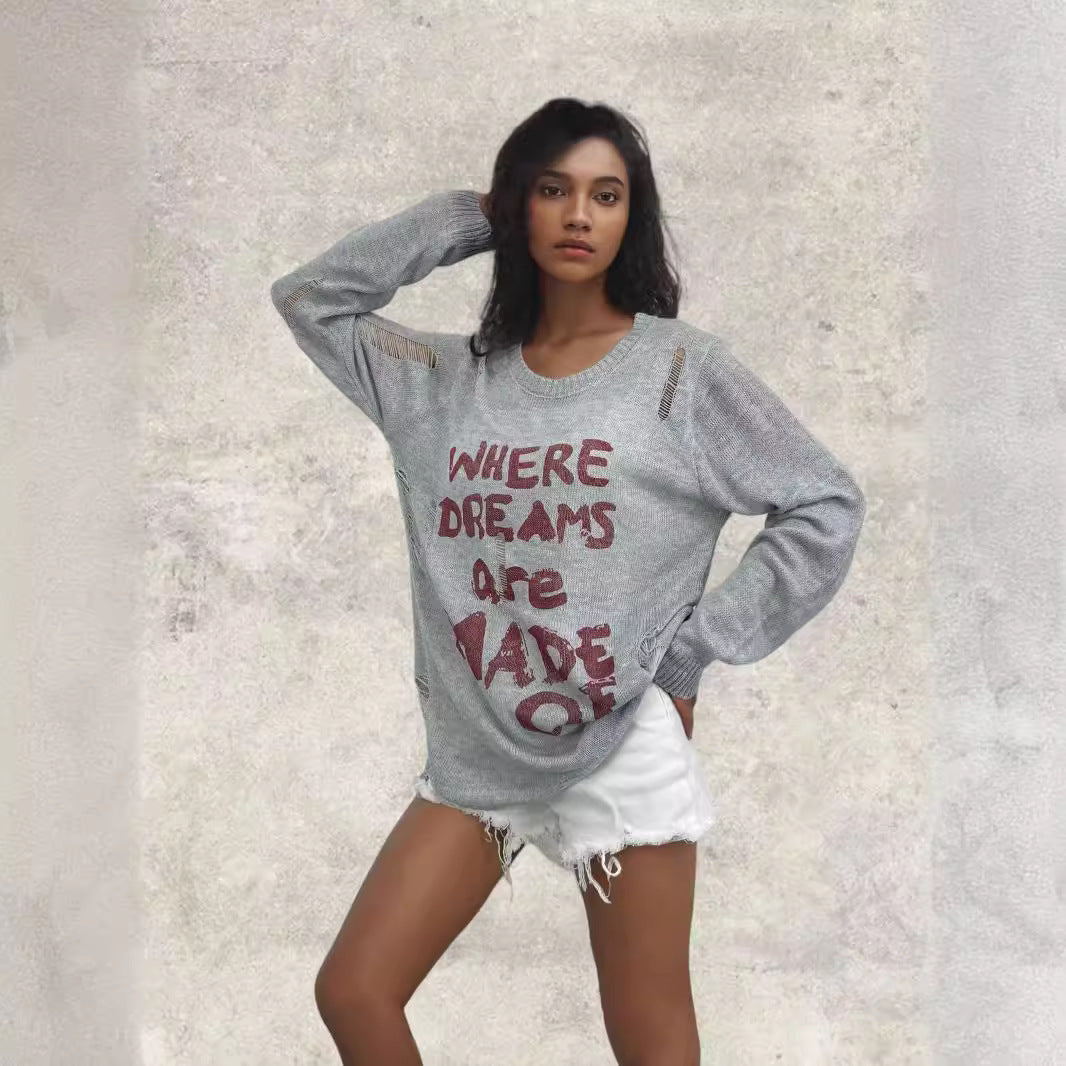 Dames pull oversize décontracté avec inscription accrocheuse et détails en tricot Chic und Stil