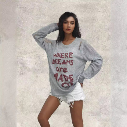 Dames pull oversize décontracté avec inscription accrocheuse et détails en tricot Chic und Stil