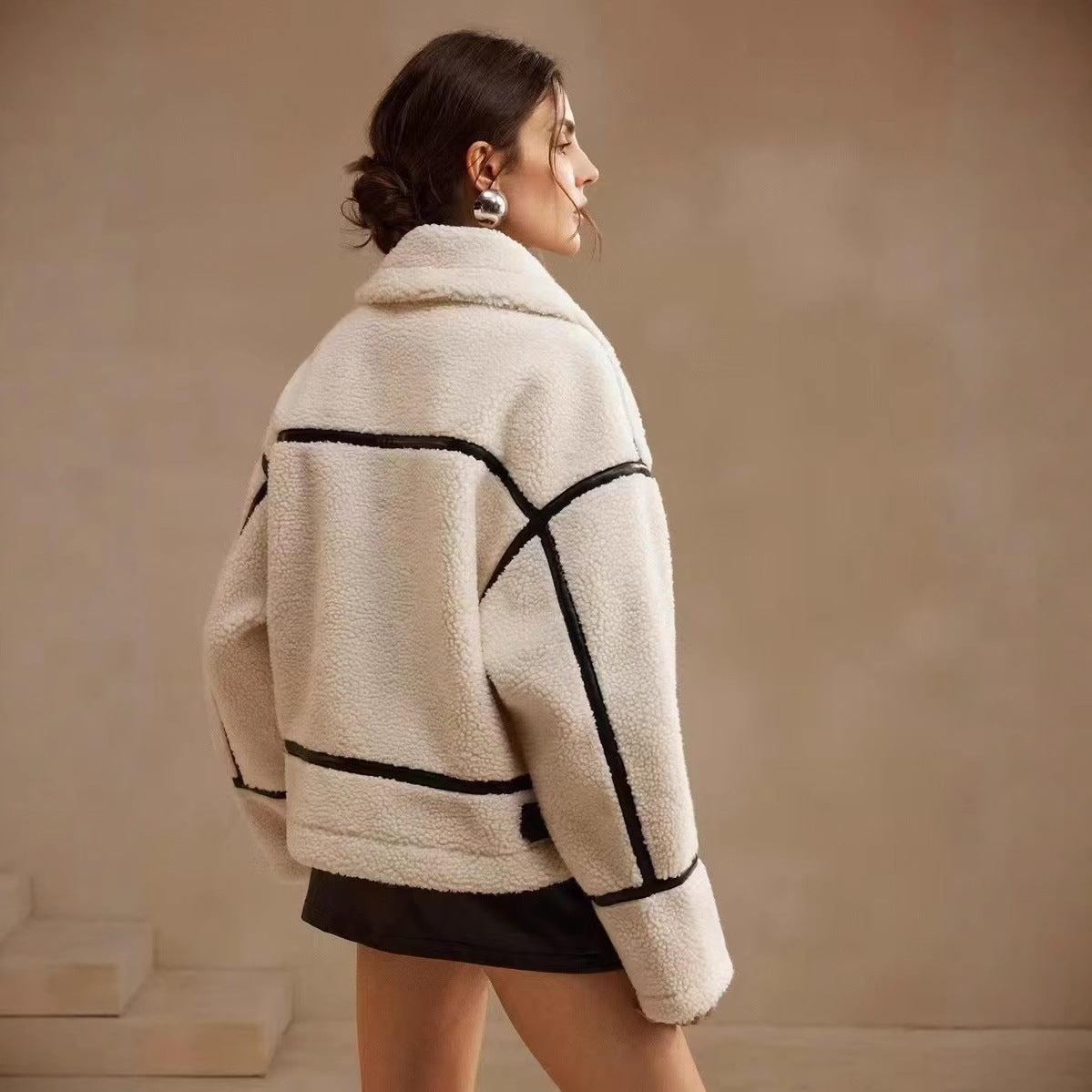 Dame veste matelassée avec col haut et poches Chic und Stil