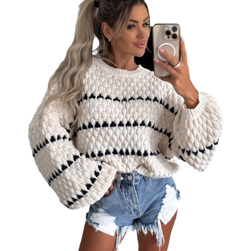 Pull en gros tricot pour femmes avec des manches volumineuses et un design de tresse moderne Chic und Stil