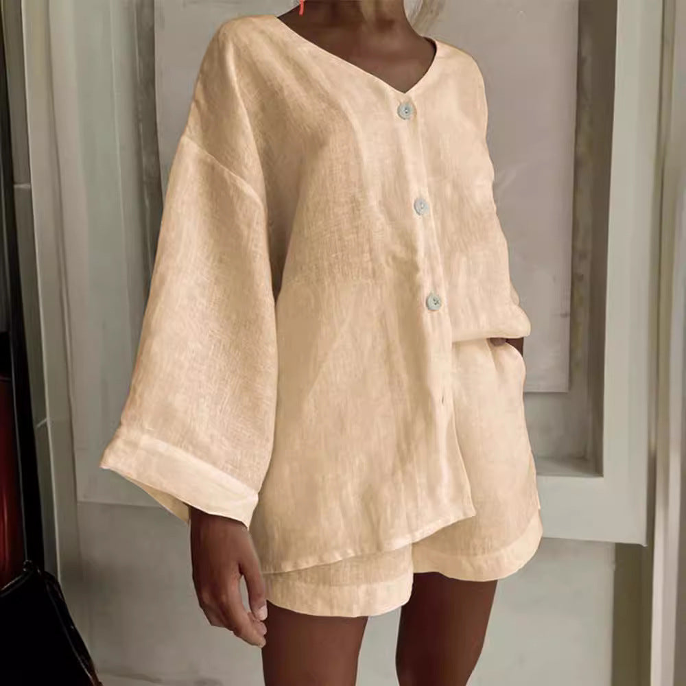 Casual women's outfit with a loose top and shorts Chic and Style