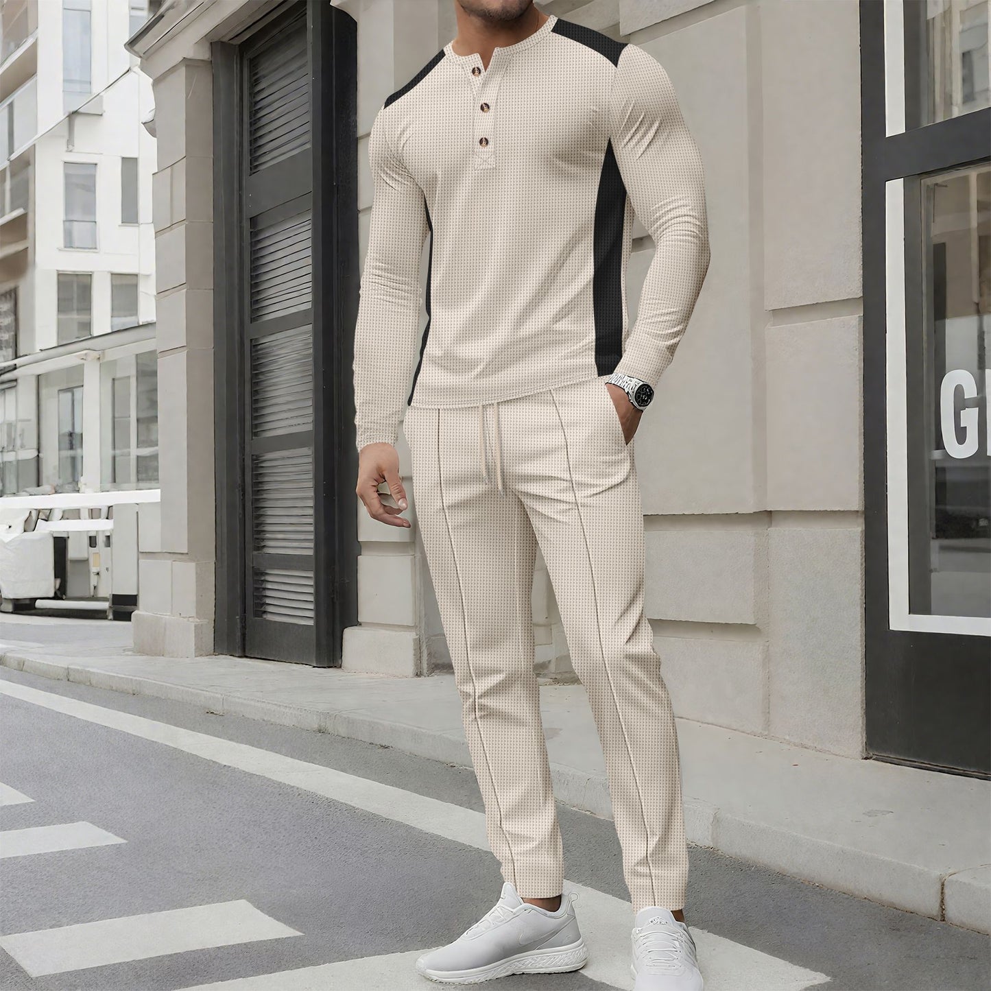 Costume de loisirs pour hommes avec un élégant haut Henley et un pantalon de jogging confortable Chic und Stil