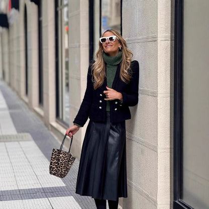 Pull femme à la mode avec col roulé et matériau doux Chic und Stil