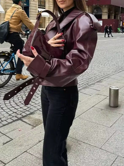 Ladies trendy oversized leather jacket with structured shoulders and waist belt Chic and Style