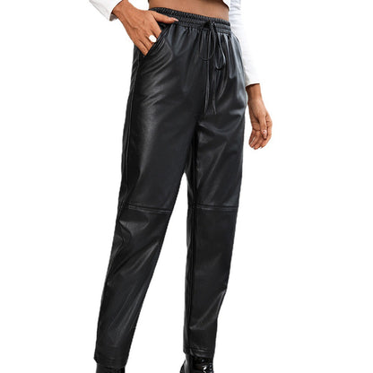 Fashionable synthetic leather pants for women with elastic waistband and side pockets Chic and Style
