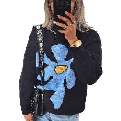 Pull femme avec motif floral saisissant et coupe décontractée Chic und Stil