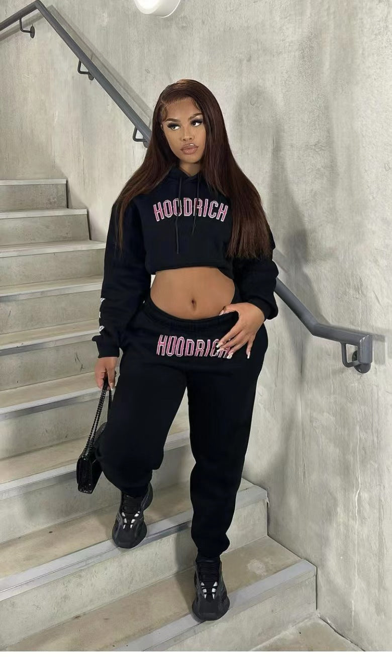 Men's sporty hoodie and jogger pants set with trendy inscription Chic und Stil