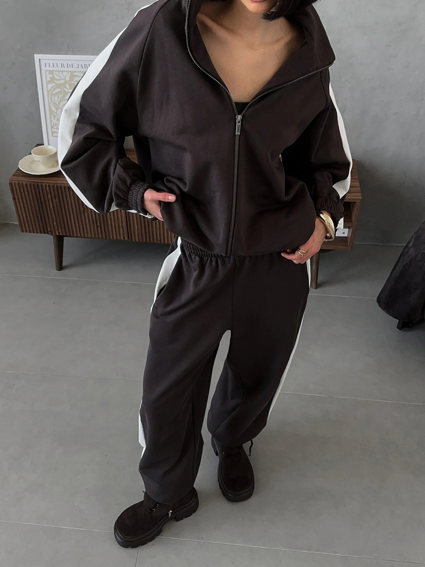 Women's sporty outfit with trendy zipper and wide pants Chic and Style