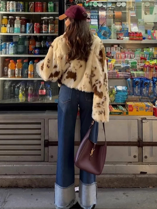 Trendy short jacket for women in faux fur with unique animal print Chic and Style