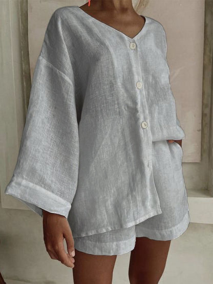 Casual women's outfit with a loose top and shorts Chic and Style