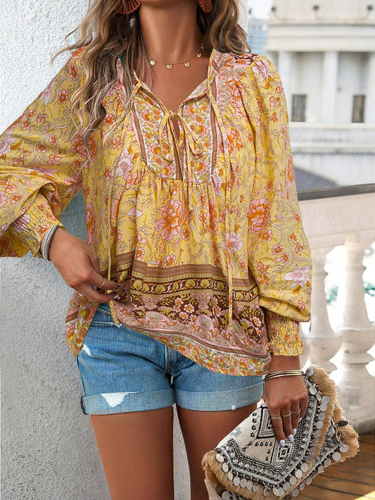 Chemisier dames avec motifs floraux et décolleté à nouer Chic und Stil