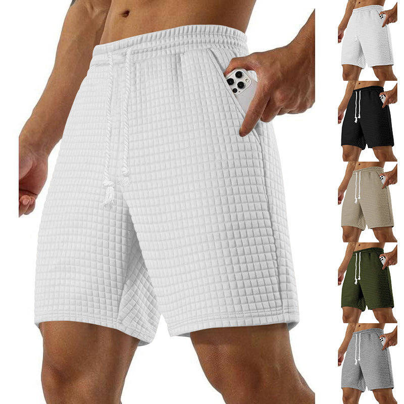 Shorts de sport pour hommes en material respirant avec poches latérales pratiques Chic und Stil
