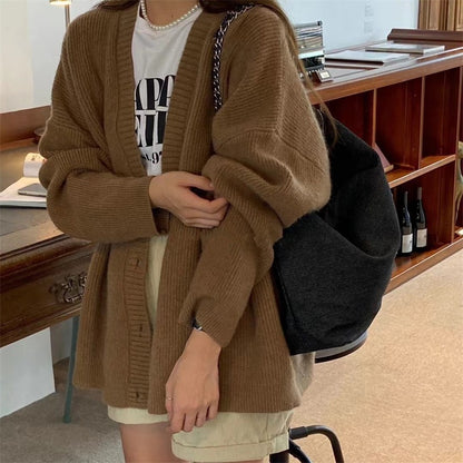 Dames gilet en tricot confortable avec épaules tombantes et détails de boutons Chic und Stil