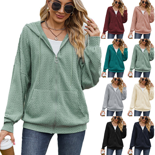 Dames Pull à capuche surdimensionné avec motif texturé et poches pratiques Chic und Stil
