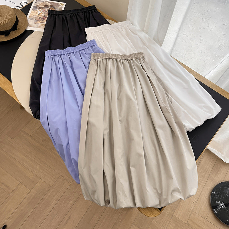 Jupe midi élégante pour femmes avec taille élastique et coupe volumineuse Chic & Stil