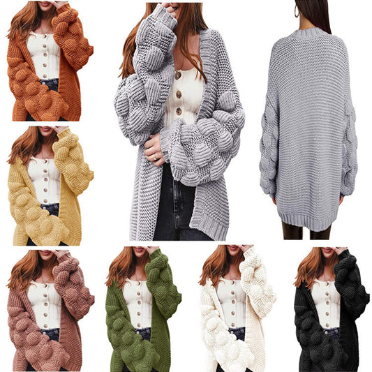 Veste en tricot pour femmes avec des manches bouffantes volumineuses et un aspect de maille structuré Chic und Stil