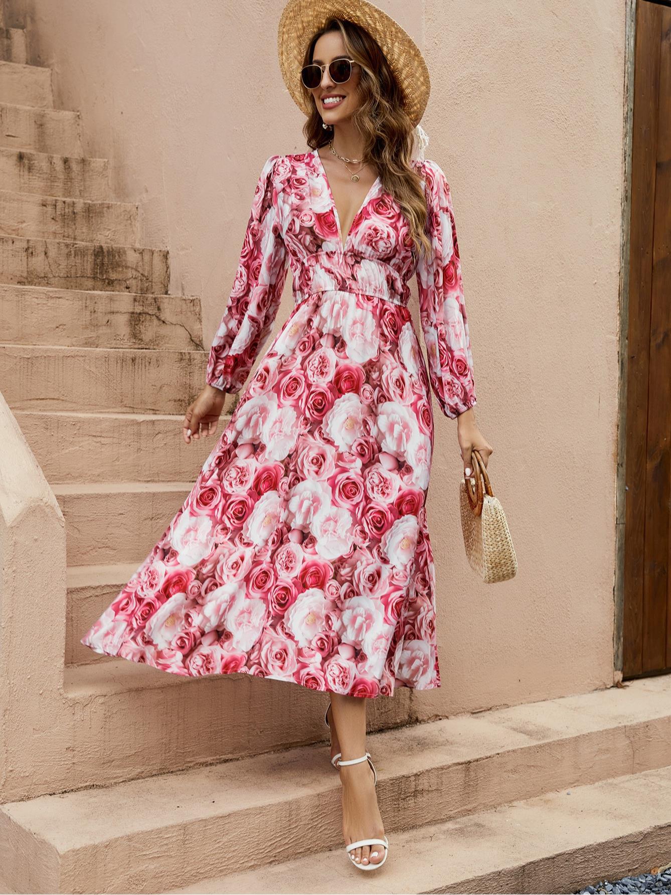 Dames Robe d'été longue avec coupe fluide et motif floral de roses Chic und Stil