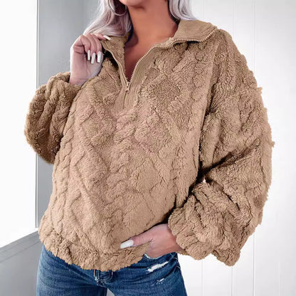 Pull en fleece douillet pour femmes avec demi-fermeture éclair et manches bouffantes Chic und Stil