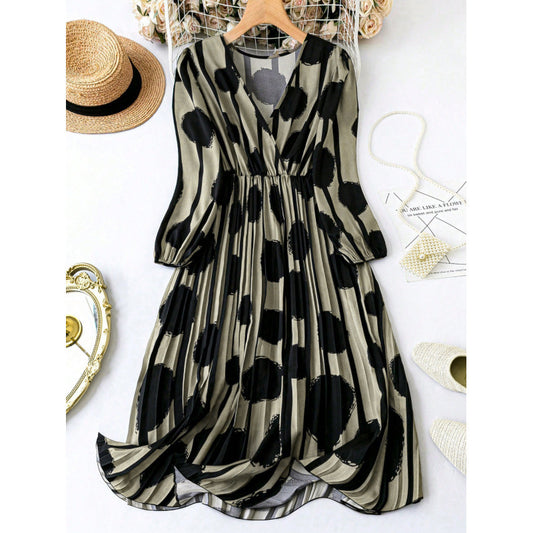 Robe maxi pour femmes avec design à pois à rayures et manches bouffantes Chic und Stil