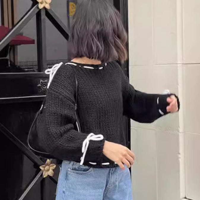 Pull décontracté pour femmes avec épaule dénudée et ceinture décorative à nouer Chic und Stil