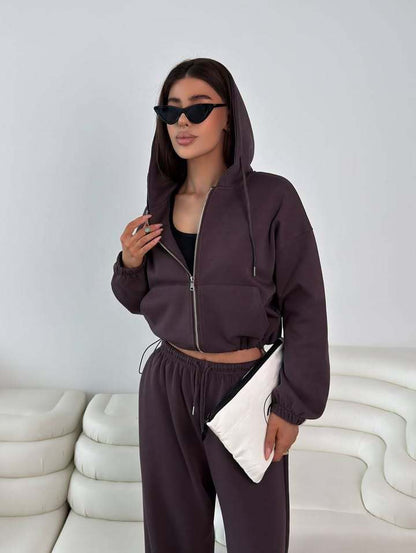 Fashionable women's hoodie with a short cut and matching jogger pants Chic and Style