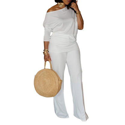 Woman Elegant set with a beautiful one-shoulder top and wide pants Chic and Style