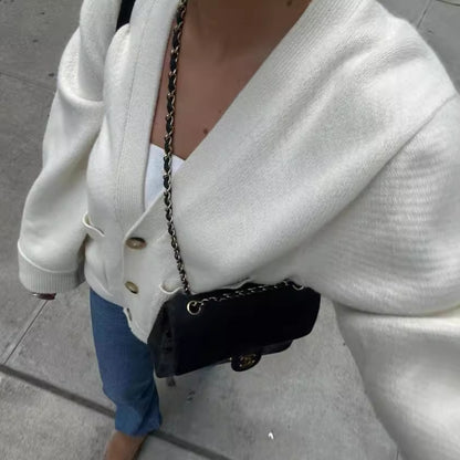 Cardigan féminin en tricot surdimensionné avec poches et décolleté en V Chic und Stil