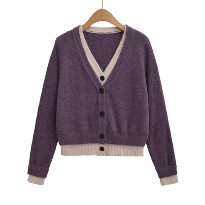 Pull élégant pour femmes avec décolleté en V profond et boutons décoratifs Chic und Stil