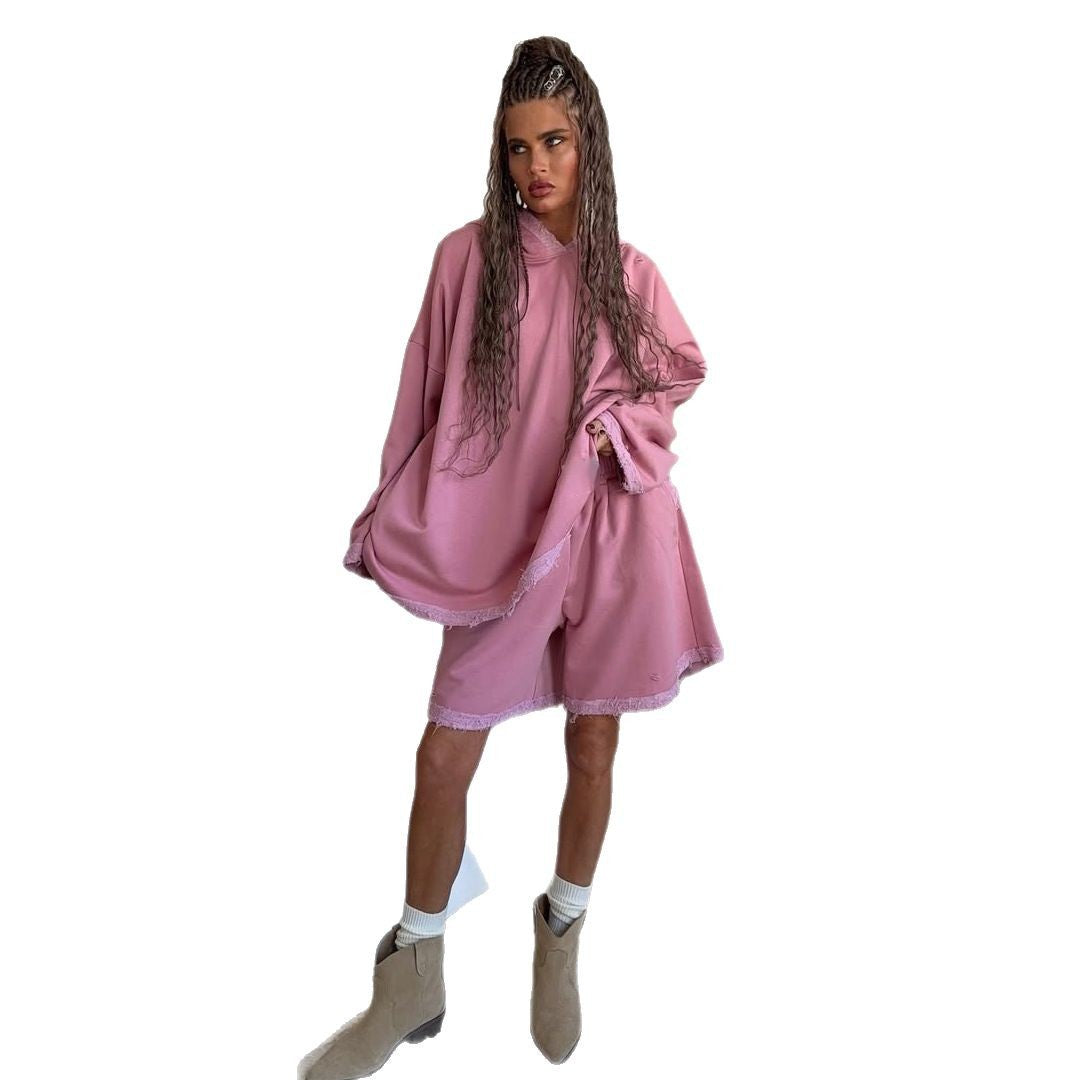 Dames sweat à capuche oversize sportif avec détails effilochés et ensemble de shorts Chic und Stil