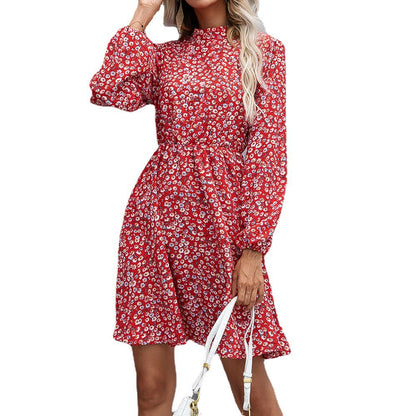 Robe mi-longue florale pour femmes avec col montant et ceinture à la taille Chic und Stil