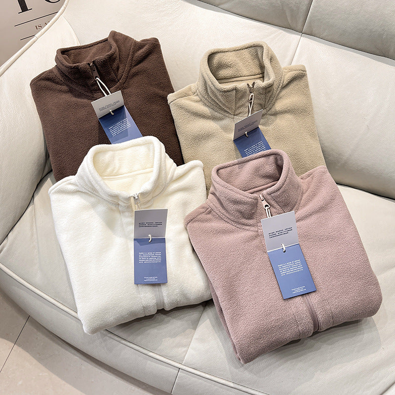 Veste en polaire pour femmes avec col haut et poches zippées sur les côtés Chic & Stil