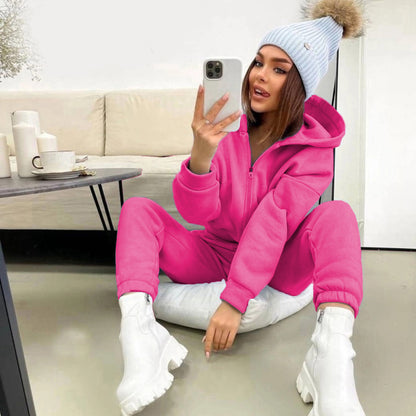 Dames combinaison sportive avec fermeture éclair intégrale et capuche Chic und Stil