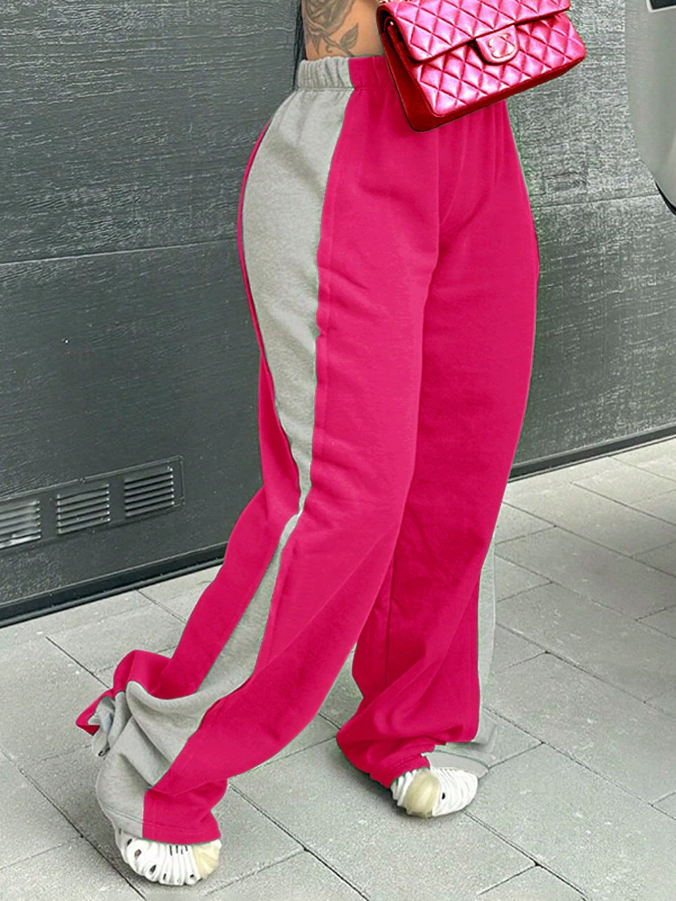 Casual women's sports pants with colorful side inserts and an elastic waistband Chic and Style
