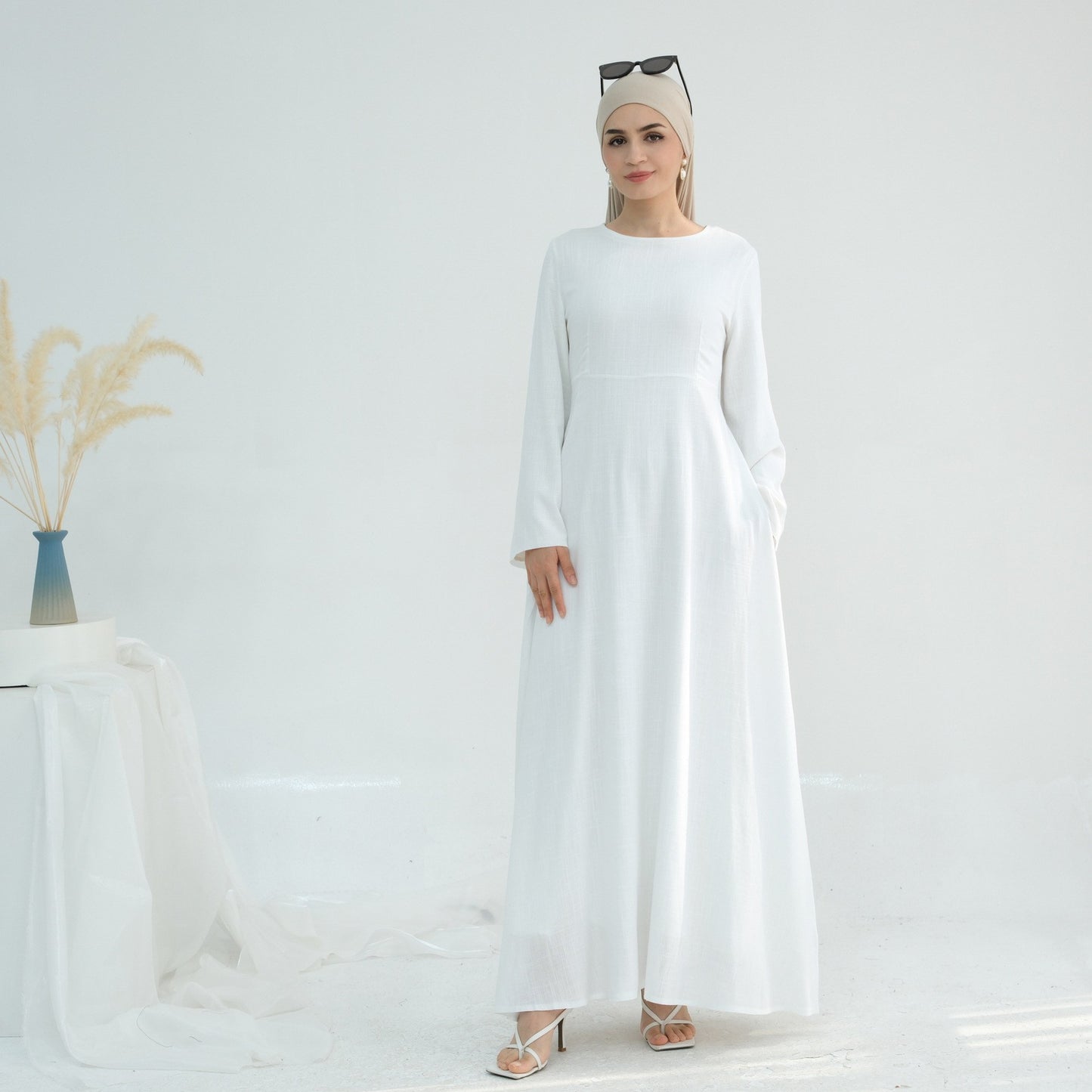 Robe maxi élégante pour dames avec des manches longues et des poches latérales Chic und Stil
