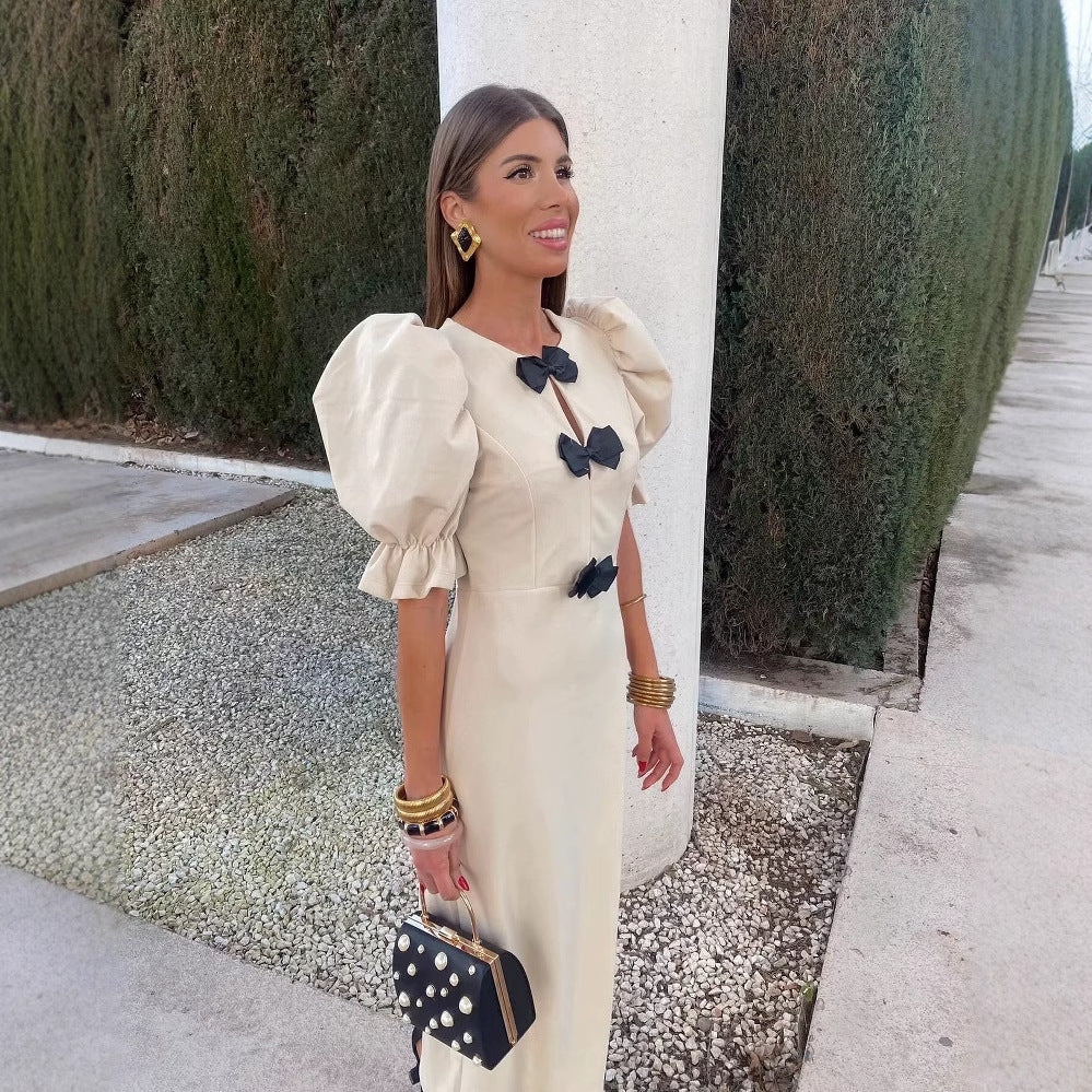 Dames Robe maxi élégante avec détail de nœud unique et conception à manches bouffantes Chic und Stil