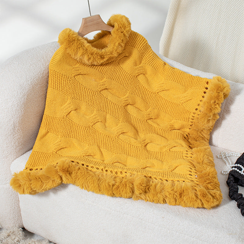 Dames pull-poncho douillet avec garniture en fausse fourrure douce et motif en torsades Chic und Stil
