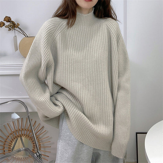 Pull femme décontracté en tricot épais avec col montant et ourlet asymétrique Chic und Stil