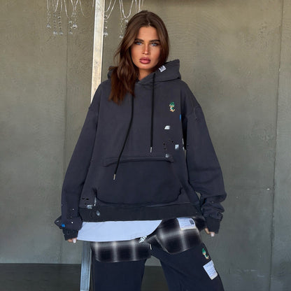 Dame Sweat à capuche surdimensionné avec des éléments de design spéciaux Chic und Stil