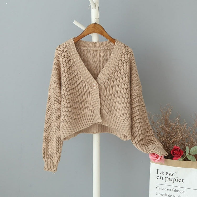 Cardigan court en tricot pour femme avec décolleté en V et détails de boutons tendance Chic und Stil