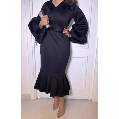 Robe ajustée pour femmes avec des manches volumineuses et un ourlet flottant Chic und Stil