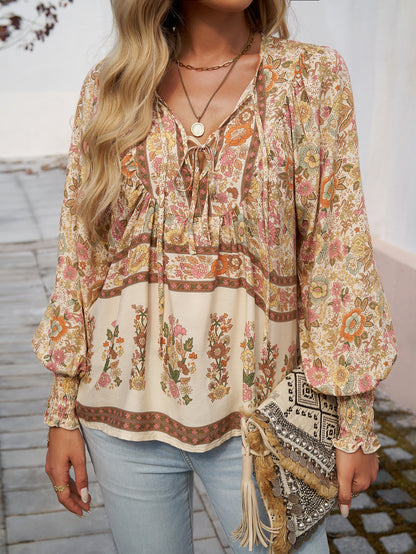 Chemisier dames avec motifs floraux et décolleté à nouer Chic und Stil